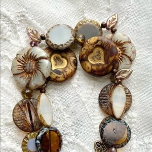 Neutrals without being boring, premium Czech, bronze wash lock & key toggle.